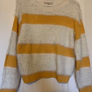 white and yellow striped fuzzy sweater